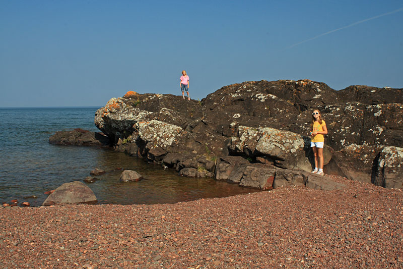 climbing the rocks at the end of hunters point